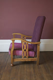 Edwardian Style Reciliner; oak frame and a upholstered fluted back. Covered in a smart Linwood plum velvet.