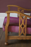 Edwardian Style Reciliner; oak frame and a upholstered fluted back. Covered in a smart Linwood plum velvet.