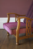 Edwardian Style Reciliner; oak frame and a upholstered fluted back. Covered in a smart Linwood plum velvet.