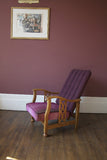 Edwardian Style Reciliner; oak frame and a upholstered fluted back. Covered in a smart Linwood plum velvet.