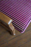 Edwardian Style Reciliner; oak frame and a upholstered fluted back. Covered in a smart Linwood plum velvet.