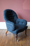 Ironback deep buttoned Victorian armchair